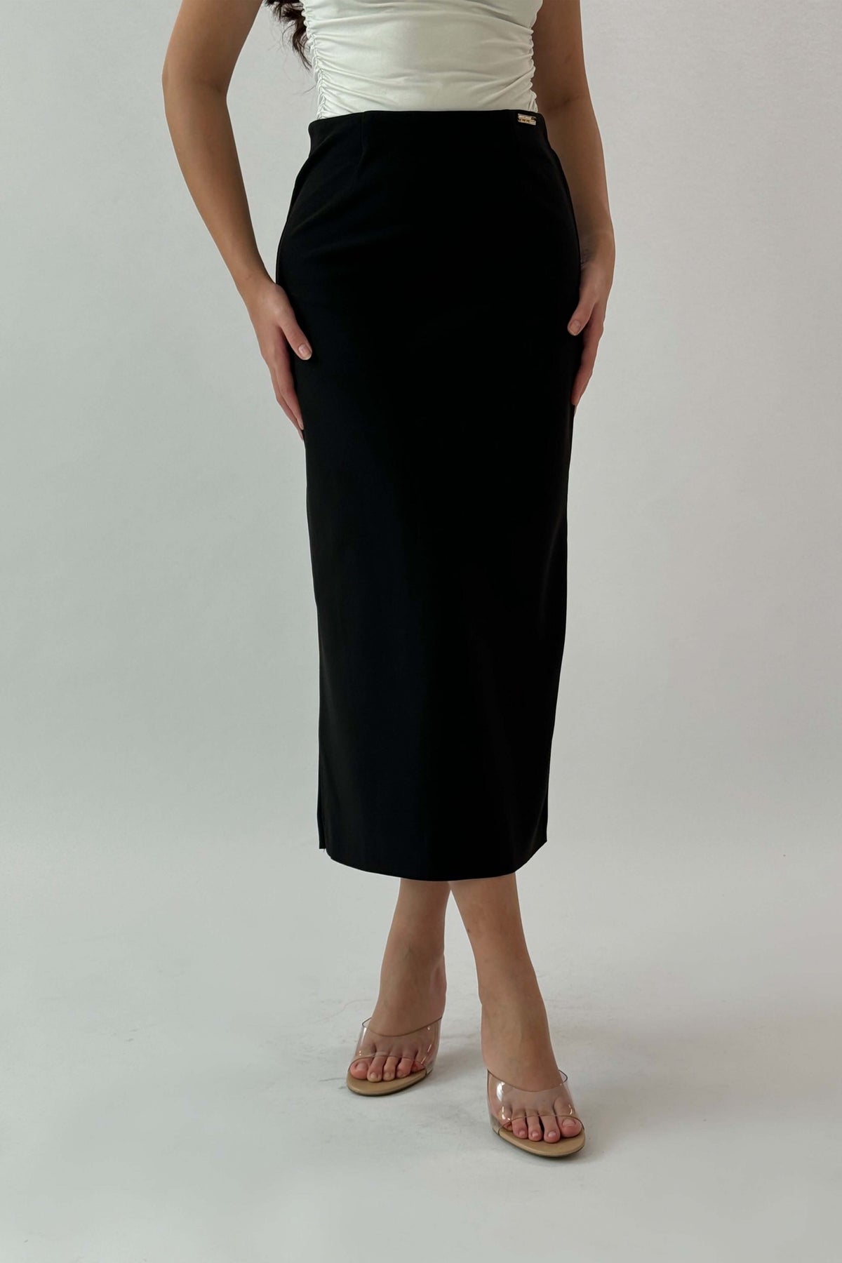 Black midi skirt with a slim fit 