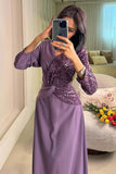 Long dress decorated with sequins in purple 