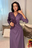 Long dress decorated with sequins in purple 