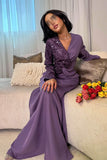 Long dress decorated with sequins in purple 