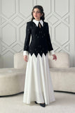 Classic long dress decorated with black stones 