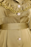 Classic dress decorated with pearl buttons 