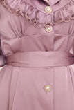 Classic dress decorated with pearl buttons 