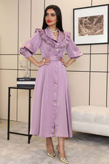 Classic dress decorated with pearl buttons 