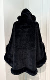 Beige shawl with cardigan sleeves and fur trim 
