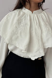 Crepe blouse with embroidered ruffle neck, white