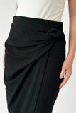 Short skirt with pleated wrap design, black 