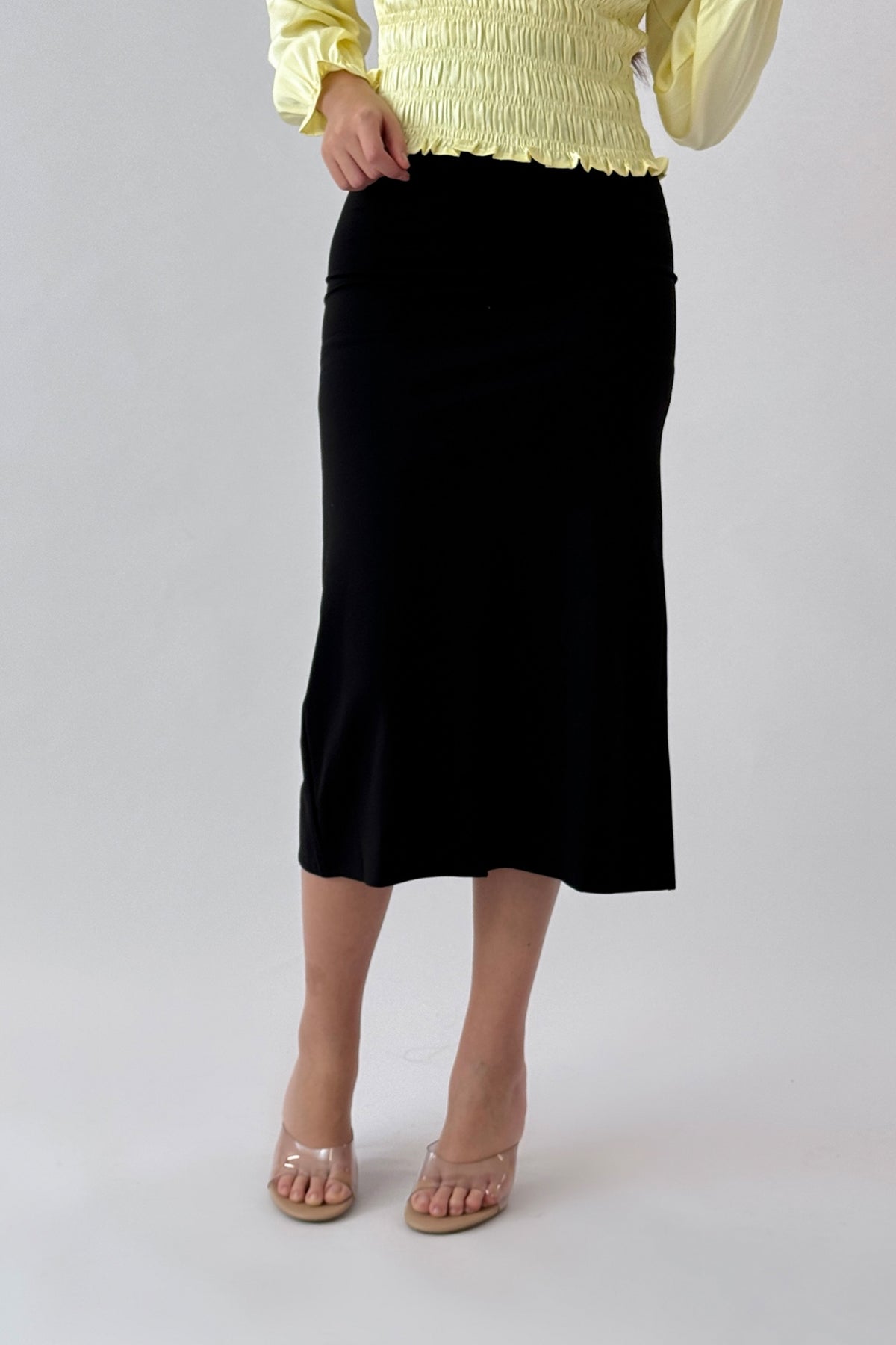 Black asymmetric satin skirt