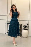 Elegant tulle midi dress in turquoise color 