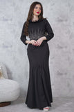 Soft evening dress decorated with shiny beads