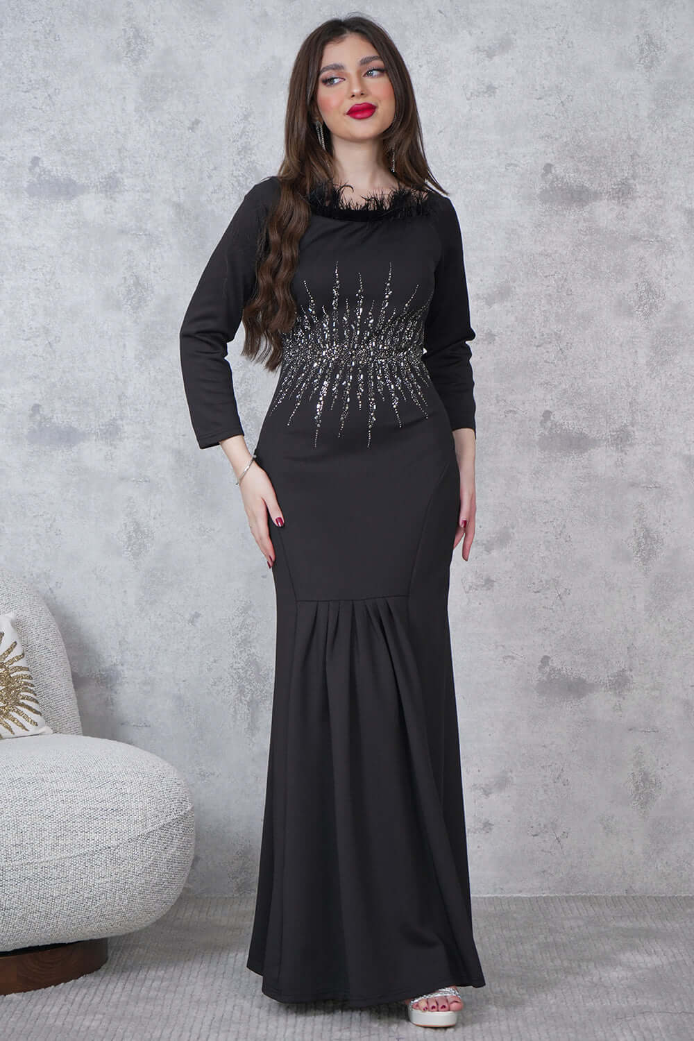 Soft evening dress decorated with shiny beads