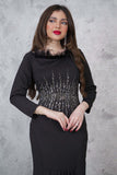 Soft evening dress decorated with shiny beads