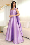 Evening dress with cape sleeves decorated with crystals 