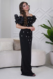 Classic long dress with a slim cut and decorated with crystals in black 