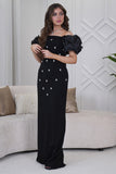 Classic long dress with a slim cut and decorated with crystals in black 