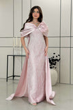 Long evening dress decorated with pink fringe 