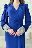 Blue stretch dress with sleeves decorated with stones 