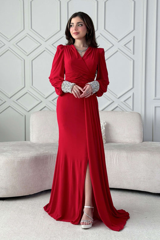 Red stretch dress with sleeves decorated with rhinestones 