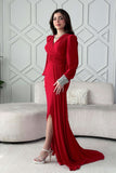 Red stretch dress with sleeves decorated with rhinestones 