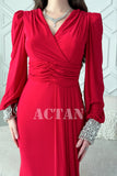 Red stretch dress with sleeves decorated with rhinestones 