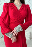 Red stretch dress with sleeves decorated with rhinestones 