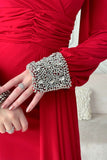 Red stretch dress with sleeves decorated with rhinestones 