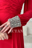 Red stretch dress with sleeves decorated with rhinestones 