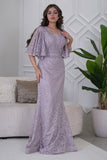 Long embroidered evening dress decorated with rhinestones in pink color 