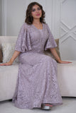 Long embroidered evening dress decorated with rhinestones in pink color 