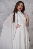 Elegant midi dress with a cape design and embellished with beads 