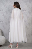 Elegant midi dress with a cape design and embellished with beads 