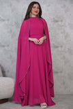 Elegant dress with a cape design decorated with beads 