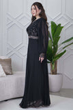 Black evening dress with embroidered piece and studs 