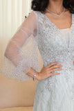 Embroidered tulle evening dress with puff sleeves 