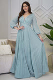 Long pleated evening dress decorated with tiffany blue stones 