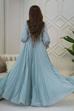 Long pleated evening dress decorated with tiffany blue stones 