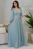 Long pleated evening dress decorated with tiffany blue stones 