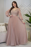 Long pleated evening dress decorated with pink stones 