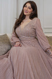 Long pleated evening dress decorated with pink stones 