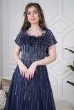 Long evening dress decorated with rhinestones and feathers in navy blue 