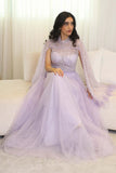 Tulle evening dress embroidered with a cape design 