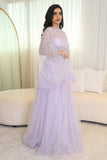 Tulle evening dress embroidered with a cape design 