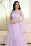 Tulle evening dress embroidered with a cape design 