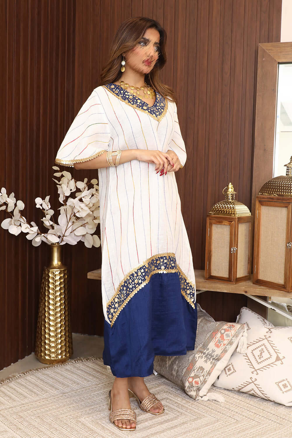 Midi striped jalabiya decorated with gold details 