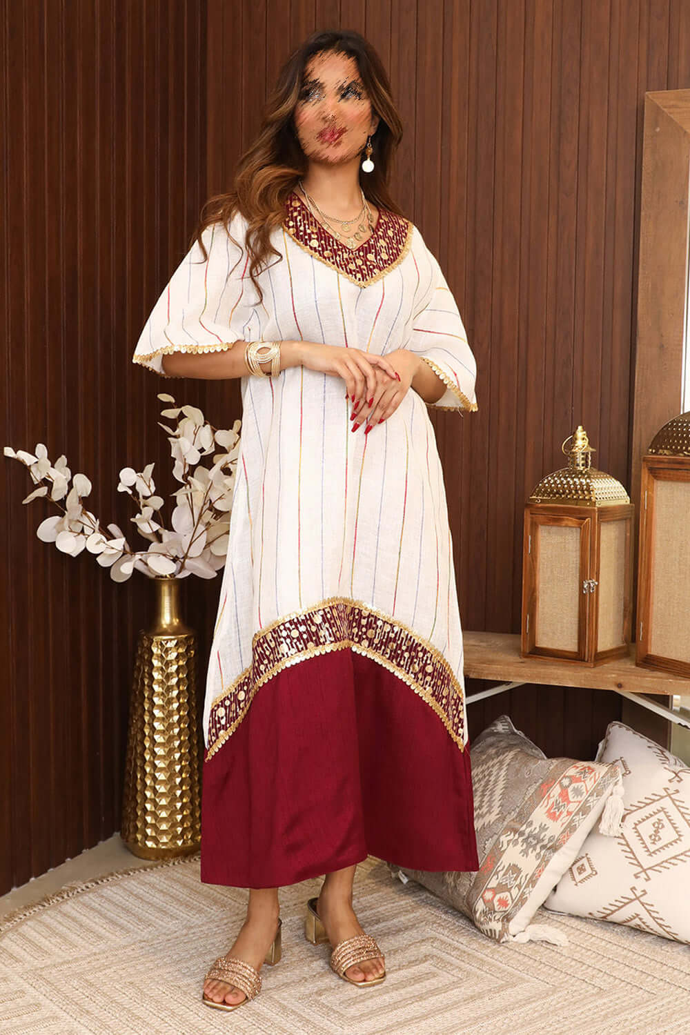 Midi striped jalabiya decorated with gold details 