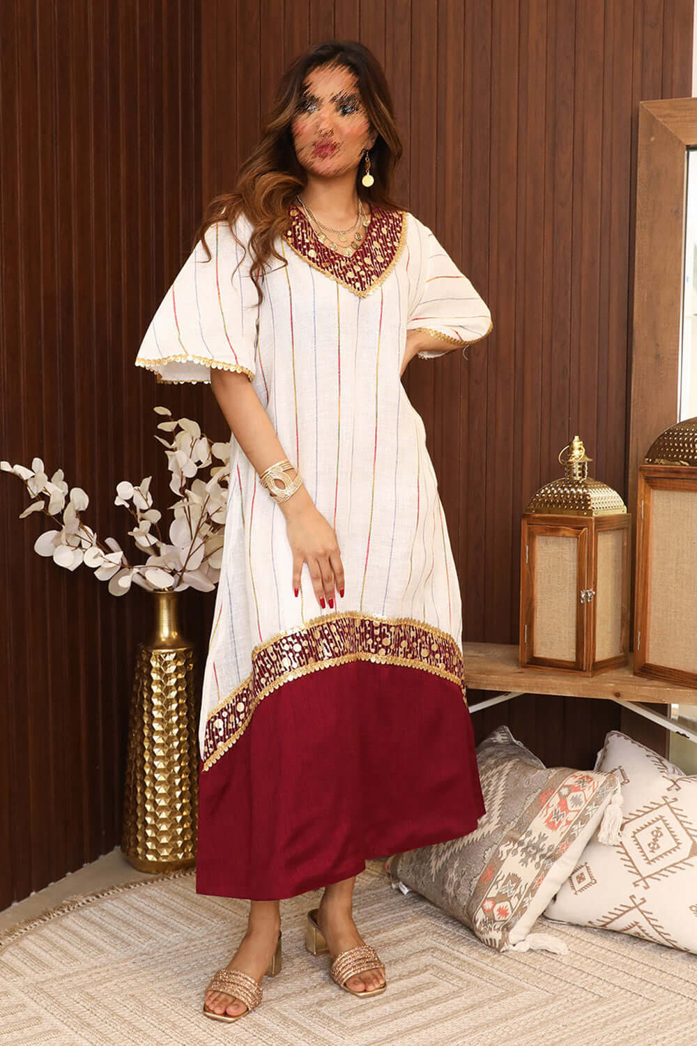 Midi striped jalabiya decorated with gold details 