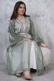 Two-piece kaftan with puff sleeves decorated with rhinestones and beads, green color 