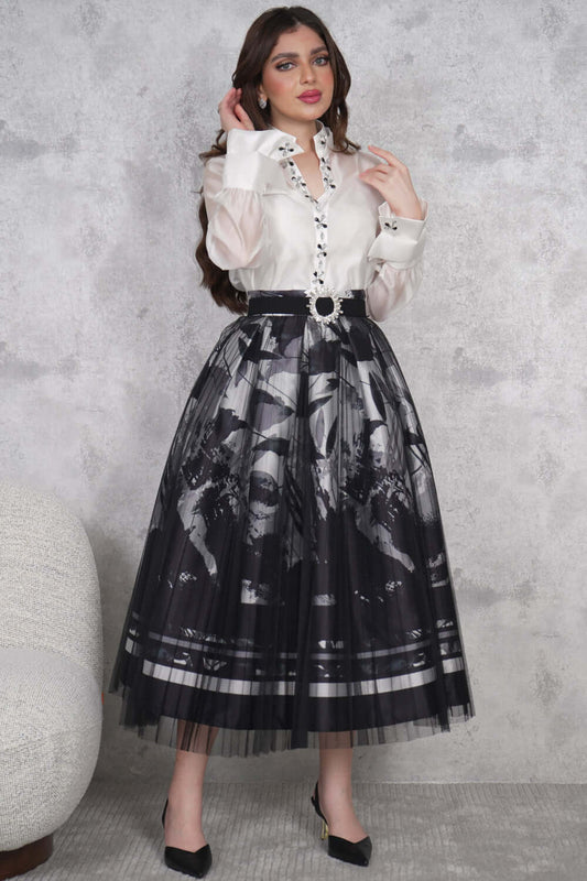 Elegant blouse and skirt set decorated with crystals 