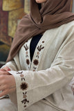 Abaya embroidered with a pattern on the back 