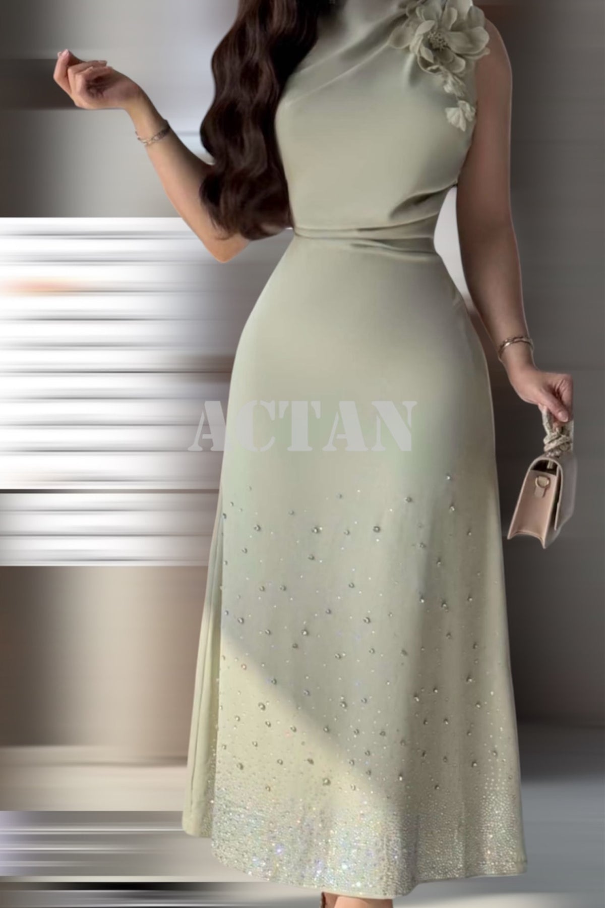 Light green draped dress with rose brooch 